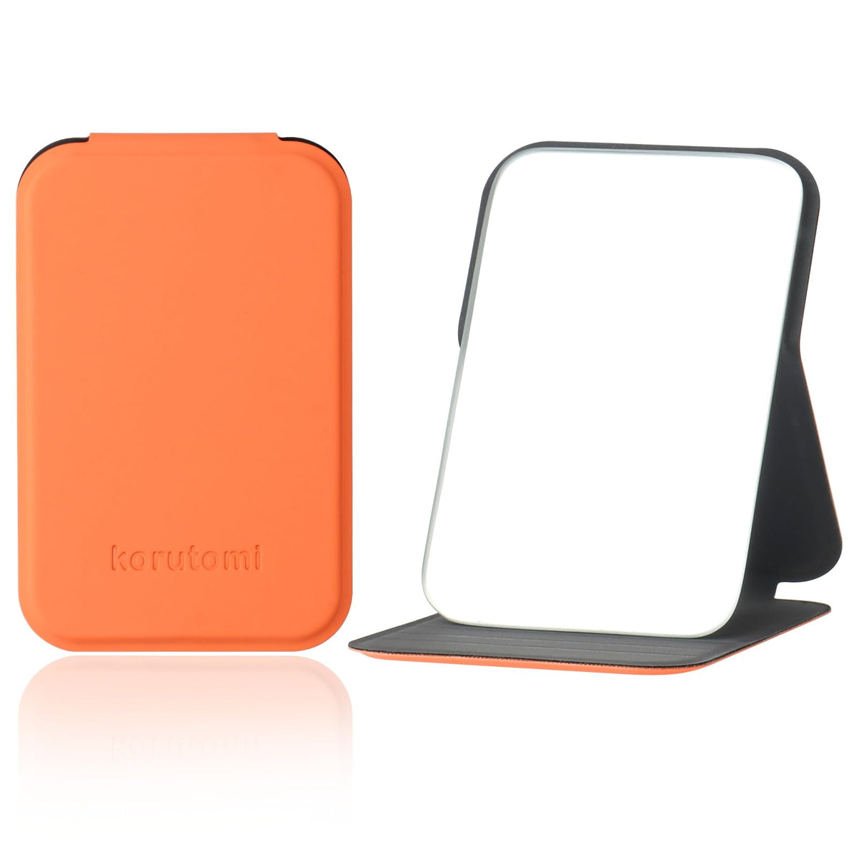 korutomi front closed orange compact mirror showing sleek travel-ready design