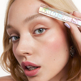 Kosas clear gel swatched on skin showing invisible hold and natural look