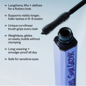 Kosas applying mascara to upper lashes for instant length and definition
