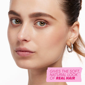 Kosas medium brown swatch on skin demonstrating buildable, natural pigment