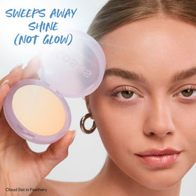 Kosas powder being swept with brush to set makeup and reduce shine benefit
