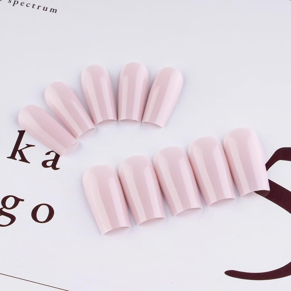 KQueenest nails worn on model hand demonstrating natural fit and instant polished appearance