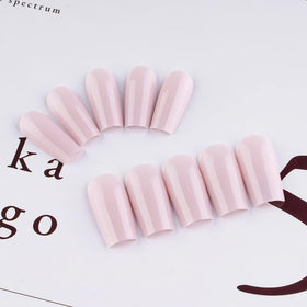 KQueenest nails worn on model hand demonstrating natural fit and instant polished appearance
