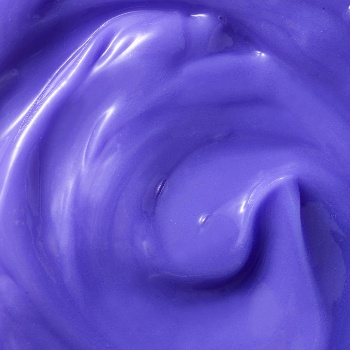Kristin Ess applying conditioner to mid-lengths and ends for toning