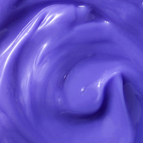 Kristin Ess applying conditioner to mid-lengths and ends for toning