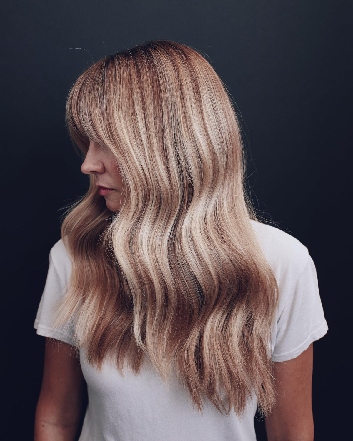 Kristin Ess before and after toning comparison showing reduced brass