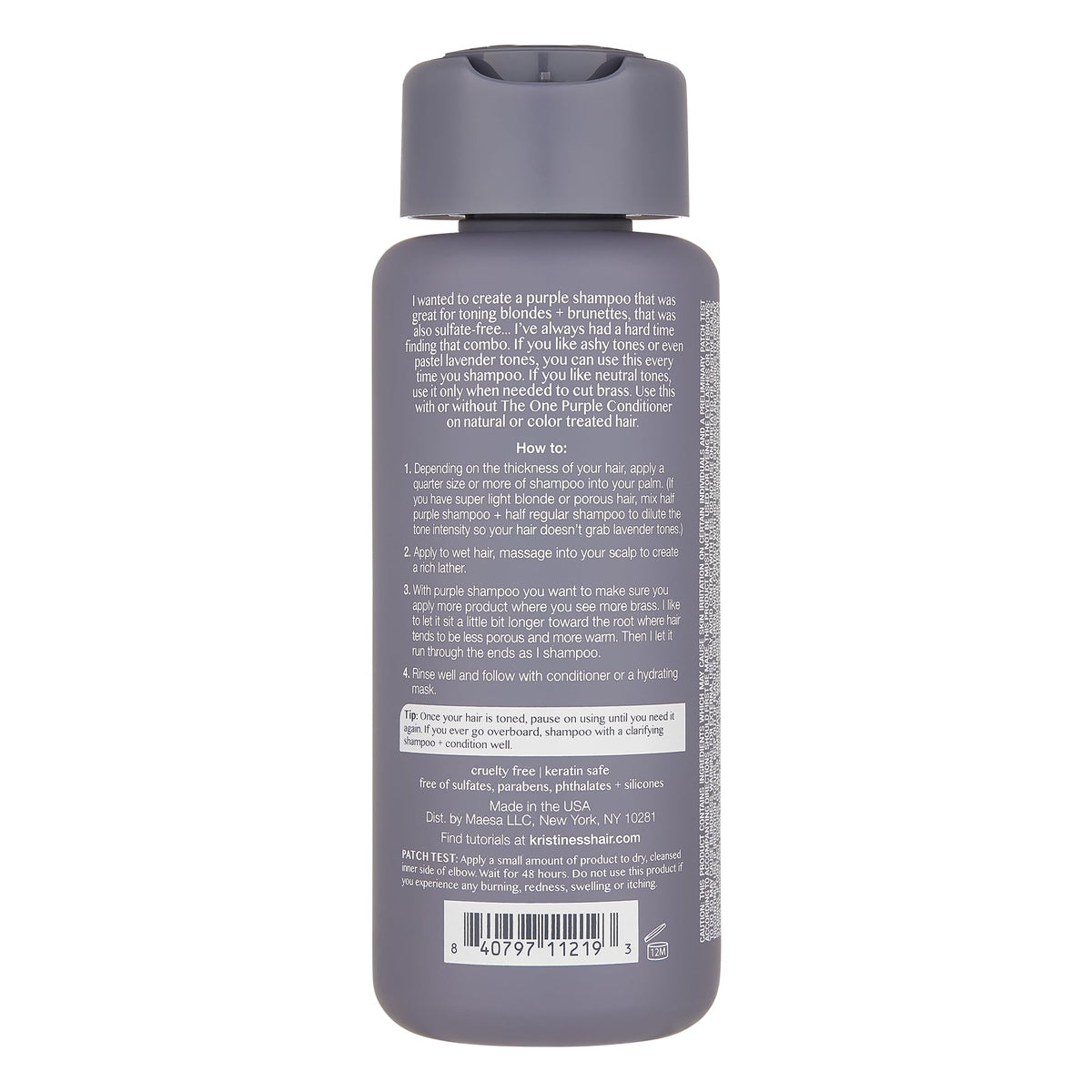 Kristin Ess cap and label detail highlighting secure closure and info