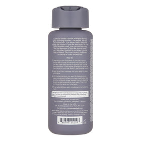 Kristin Ess cap and label detail highlighting secure closure and info