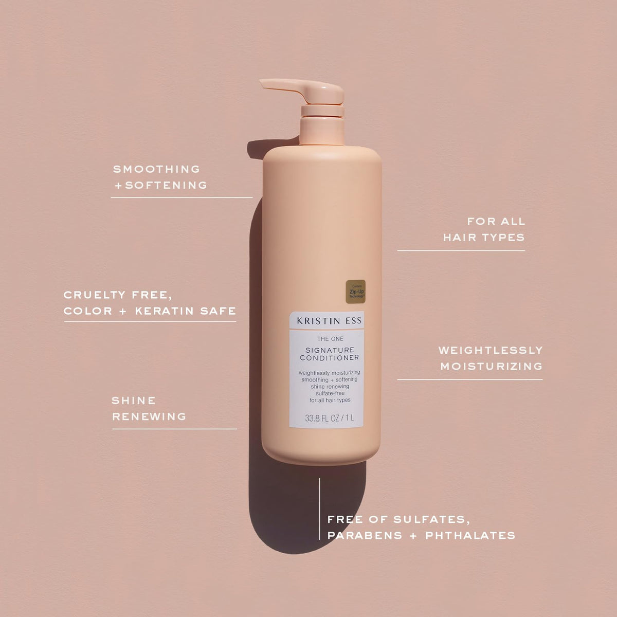Kristin Ess conditioner applied to damp hair reducing tangles