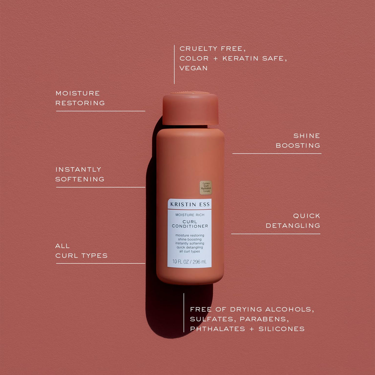 Kristin Ess conditioner in hand applied to wet hair improving manageability benefit