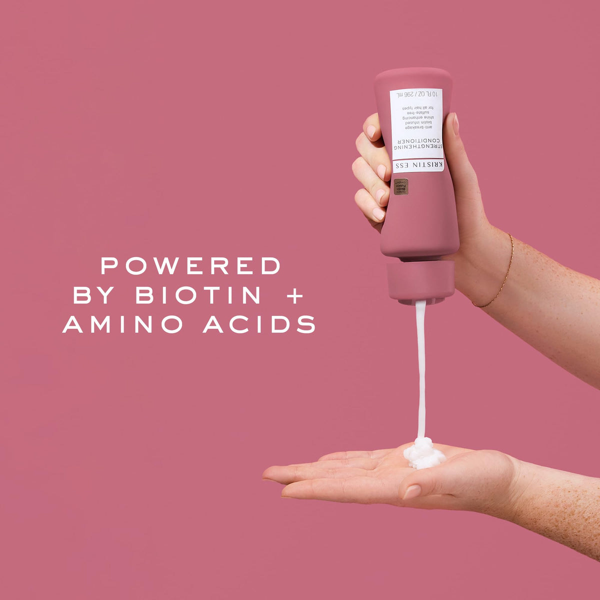 Kristin Ess open jar texture highlighting rich moisturizing formula benefits