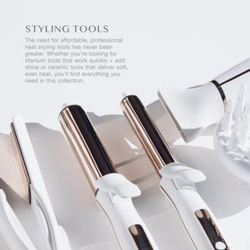Kristin Ess curling iron being used on long hair producing wide relaxed waves