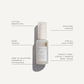 Kristin Ess in use on wet hair applying spray for easier styling