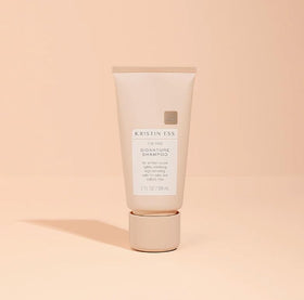 Kristin Ess product label close-up highlighting sulfate-free and vegan claims