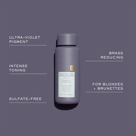 Kristin Ess purple shampoo lather close-up showing rich toning foam