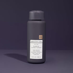 Kristin Ess product displayed on bathroom shelf for lifestyle appeal