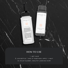 Kristin Ess lifestyle shot on bathroom shelf suggesting salon-like results at home