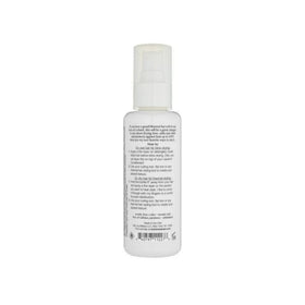 Kristin Ess bottle staged on a vanity conveying daily styling convenience benefit