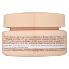 Kristin Ess open jar displaying creamy texture for easy spread and detangling benefits