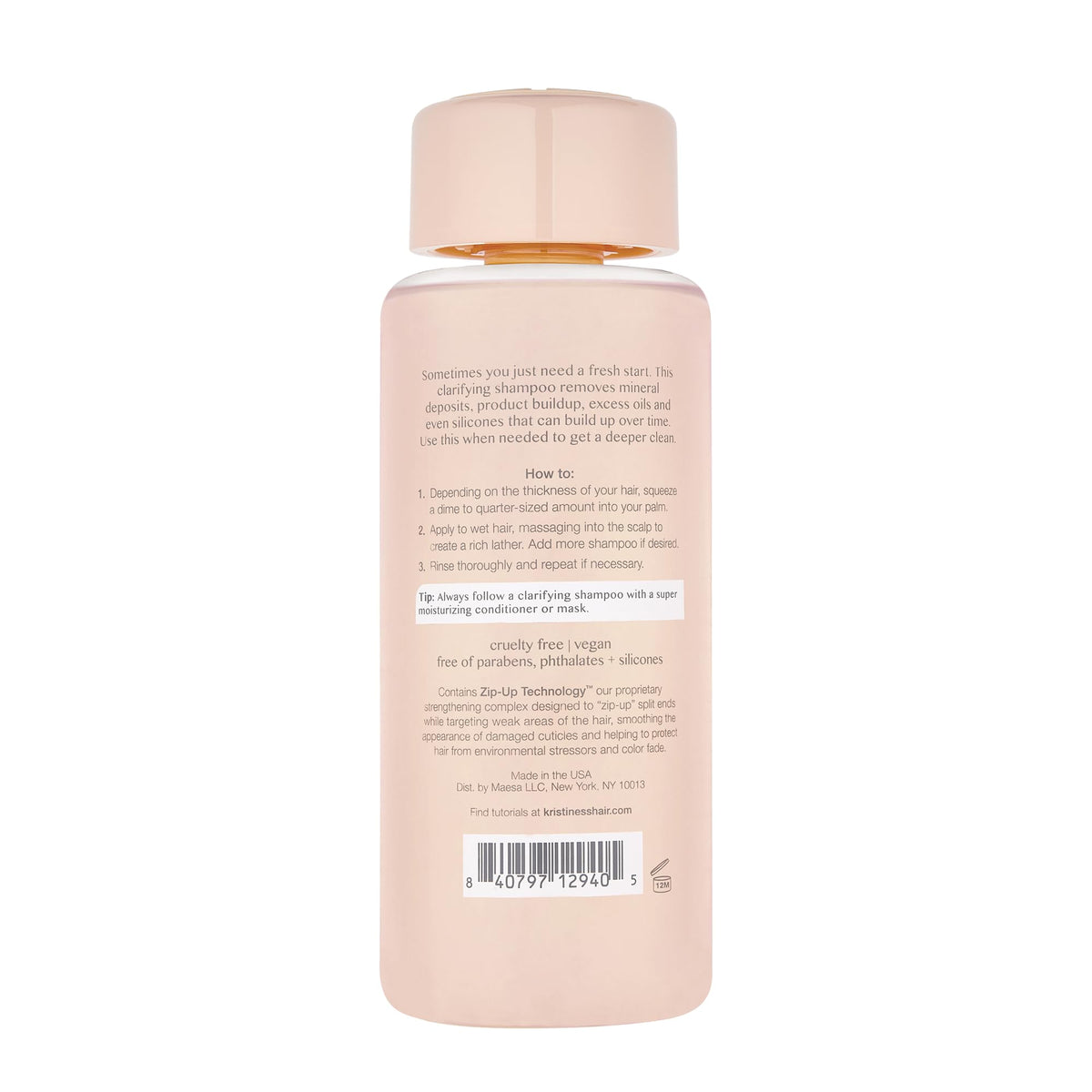 Kristin Ess pump and label closeup highlighting clean ingredients and easy dispensing
