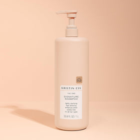Kristin Ess shampoo paired with conditioner showing routine-ready set and smooth hair benefit