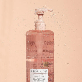 Kristin Ess shampoo lather close-up demonstrating deep-cleansing texture