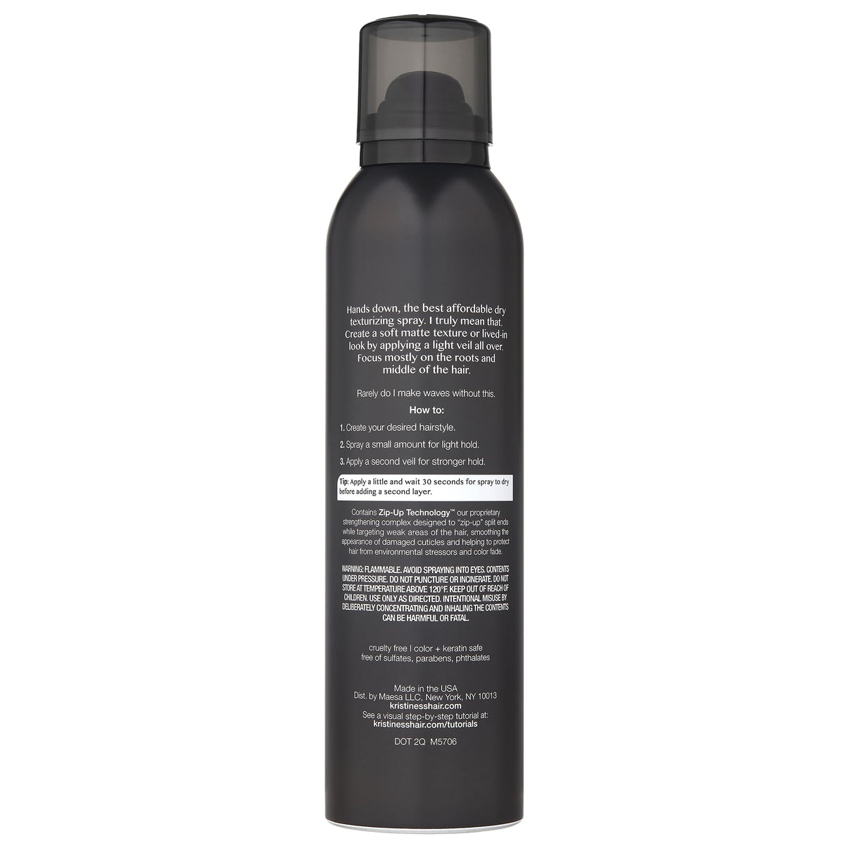 Kristin Ess spray nozzle close-up producing fine mist for even hold