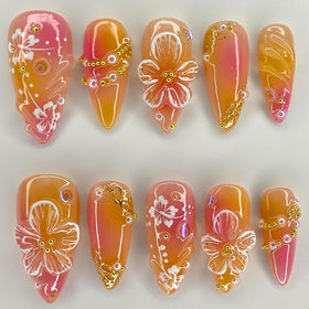 krtbkr front packaging showing orange floral press-on nails, ready-to-wear style