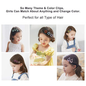KUBOM clips in use on a toddler braid demonstrating comfortable secure hold