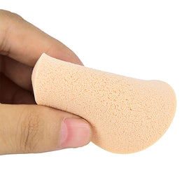 Kukiwhy sponges arranged flat to show uniform round shape and size