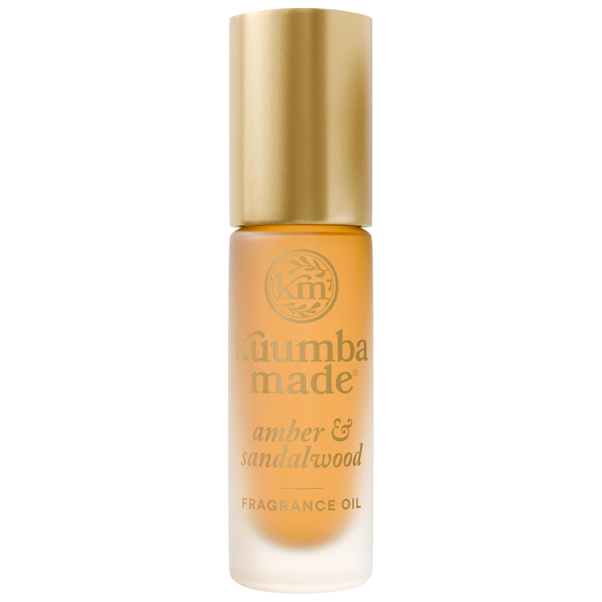 Kuumba Made front bottle view showing amber and sandalwood packaging benefit portable scent