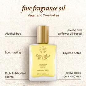 Kuumba Made rollerball and cap detail showing precise, mess-free application