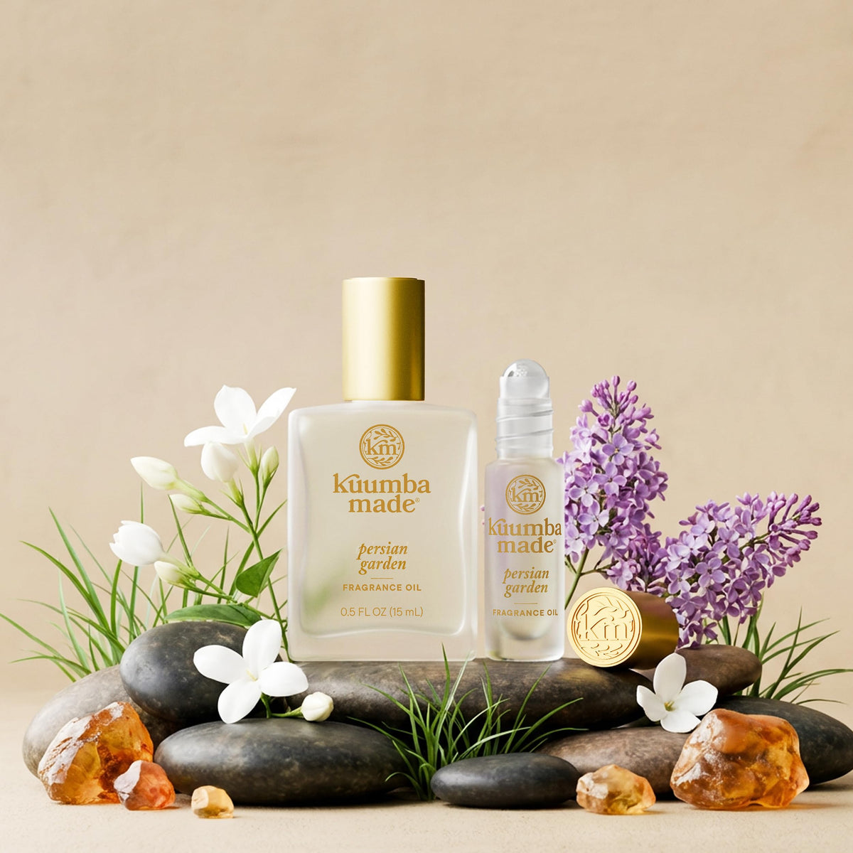 Kuumba Made flatlay with flowers illustrating floral-amber scent inspiration