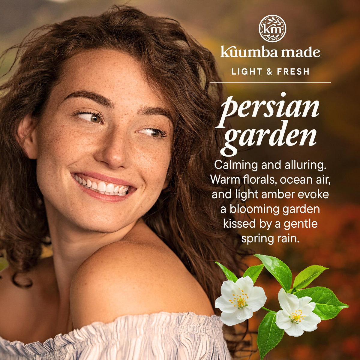 Kuumba Made oil drop on skin highlighting moisturized finish and long-lasting scent