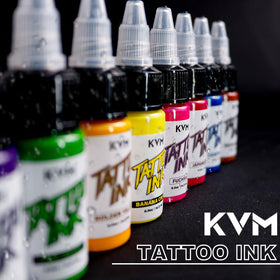 KVM studio workstation with bottles displaying organized workflow benefit