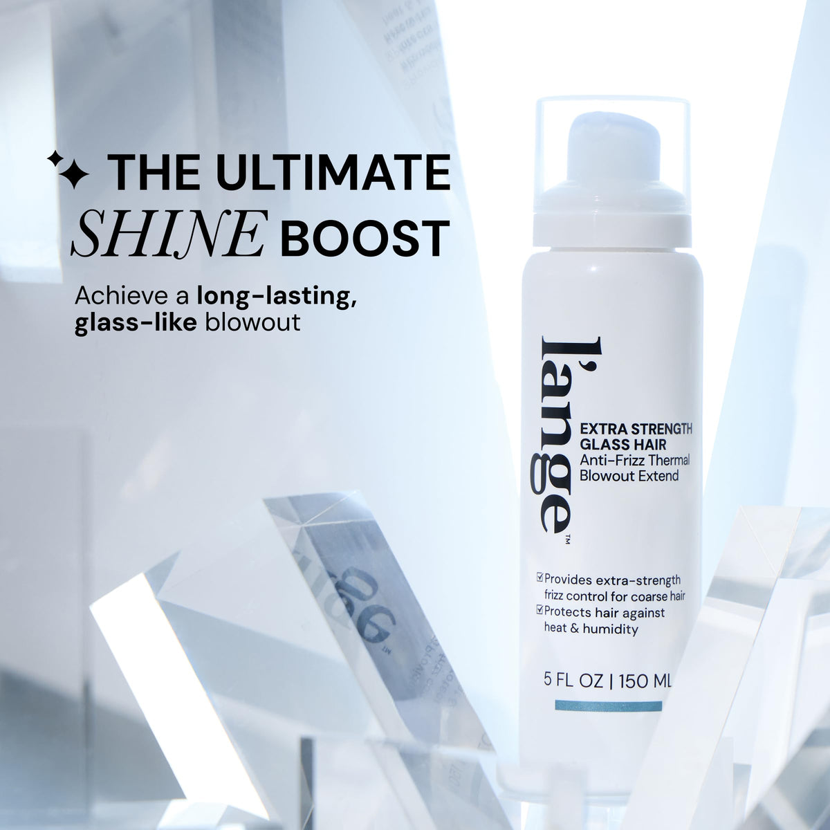 L'ANGE HAIR bottle beside baobab seed image emphasizing nourishing ingredient benefit