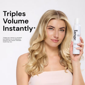 L'ANGE HAIR spray being applied to hair strands showing airy grip and enhanced separation