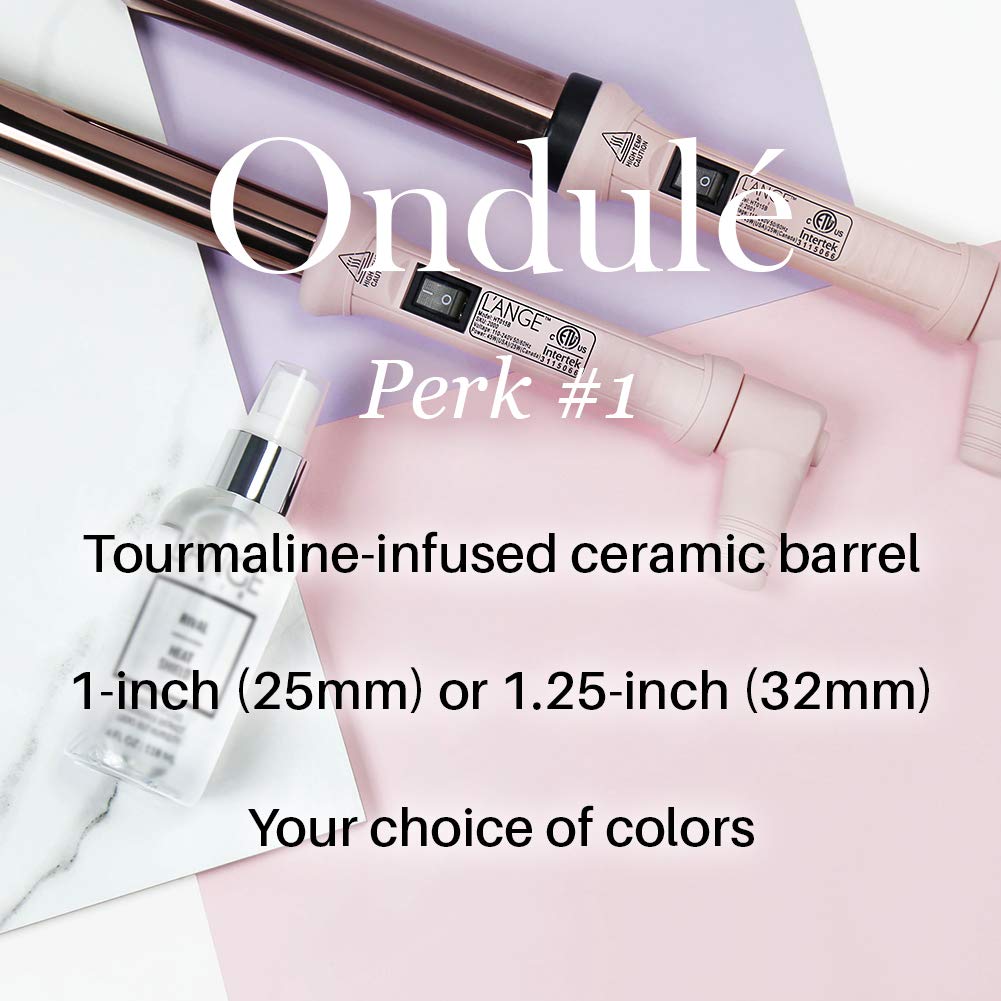L'ANGE HAIR wand held in hand to show scale and comfortable grip for precise curling