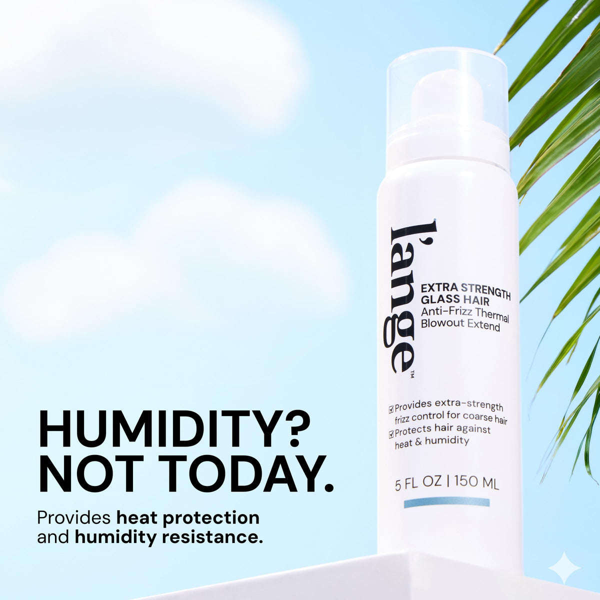L'ANGE HAIR bottle in hand showing size and travelable convenience benefit