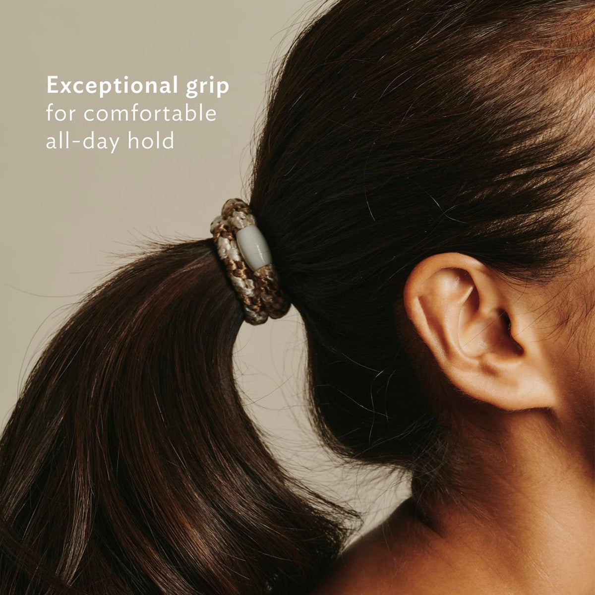 L. Erickson bead detail in neutral tone, secures knot with smooth finish