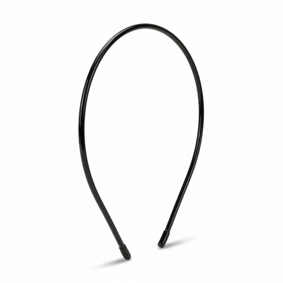 L. Erickson front view of black thin headband showing sleek silhouette and polish