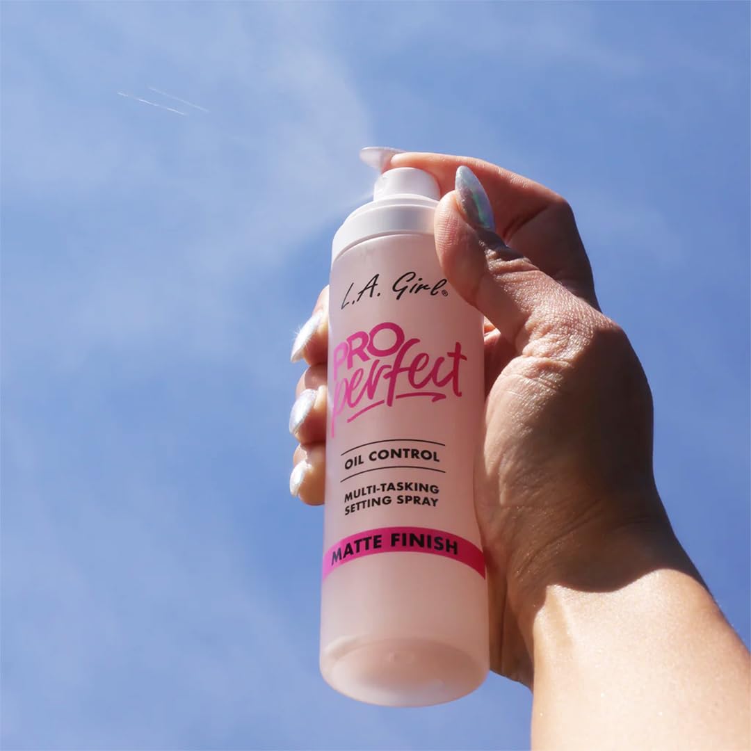 L.A. Girl mist spraying demonstrating fine atomized application for even coverage