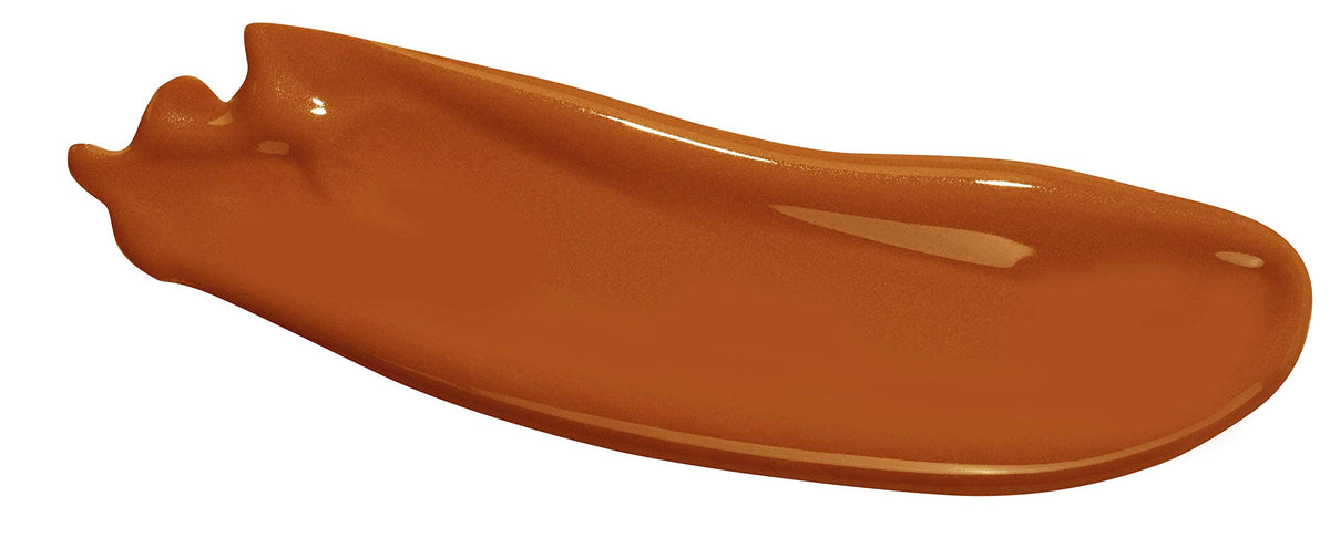 L.A. Girl orange pigment nozzle dispensing a drop for precise mixing control