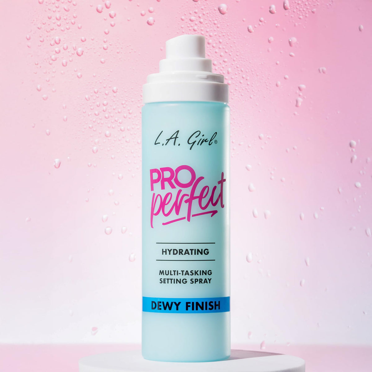 L.A. Girl bottle in hand showing size and travel-friendly benefit