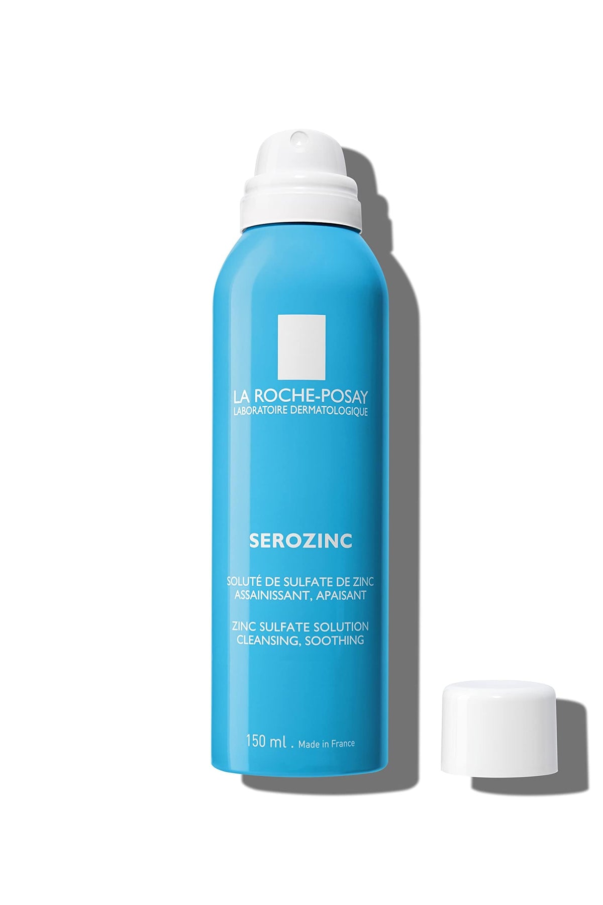 La Roche-Posay Serozinc held in hand for scale showing travel-friendly 5 fl oz size