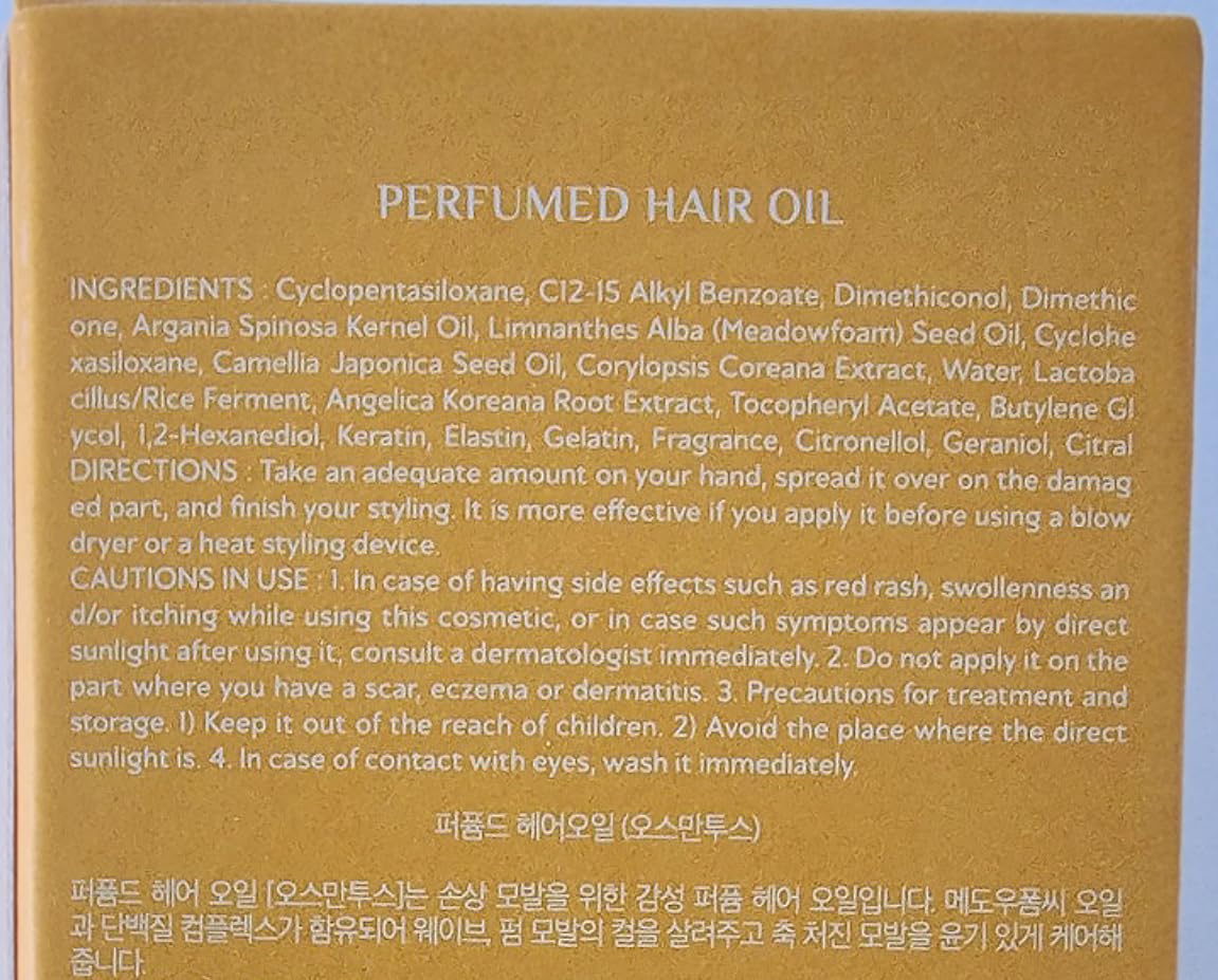 LA'DOR bottle beside osmanthus flowers showing scent inspiration and floral notes benefit fragrant finish