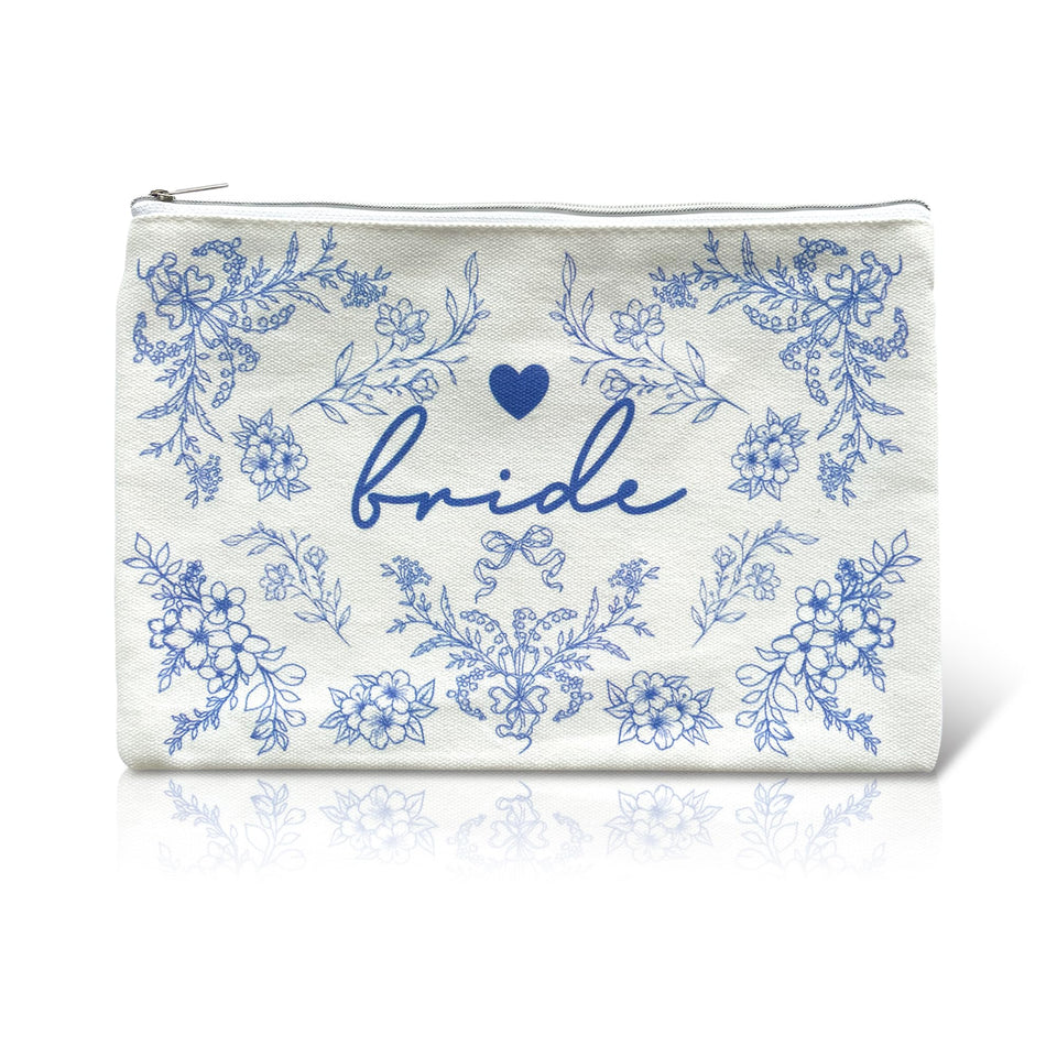 LADY&HOME front view of bride makeup bag showing elegant blue pattern and bride script
