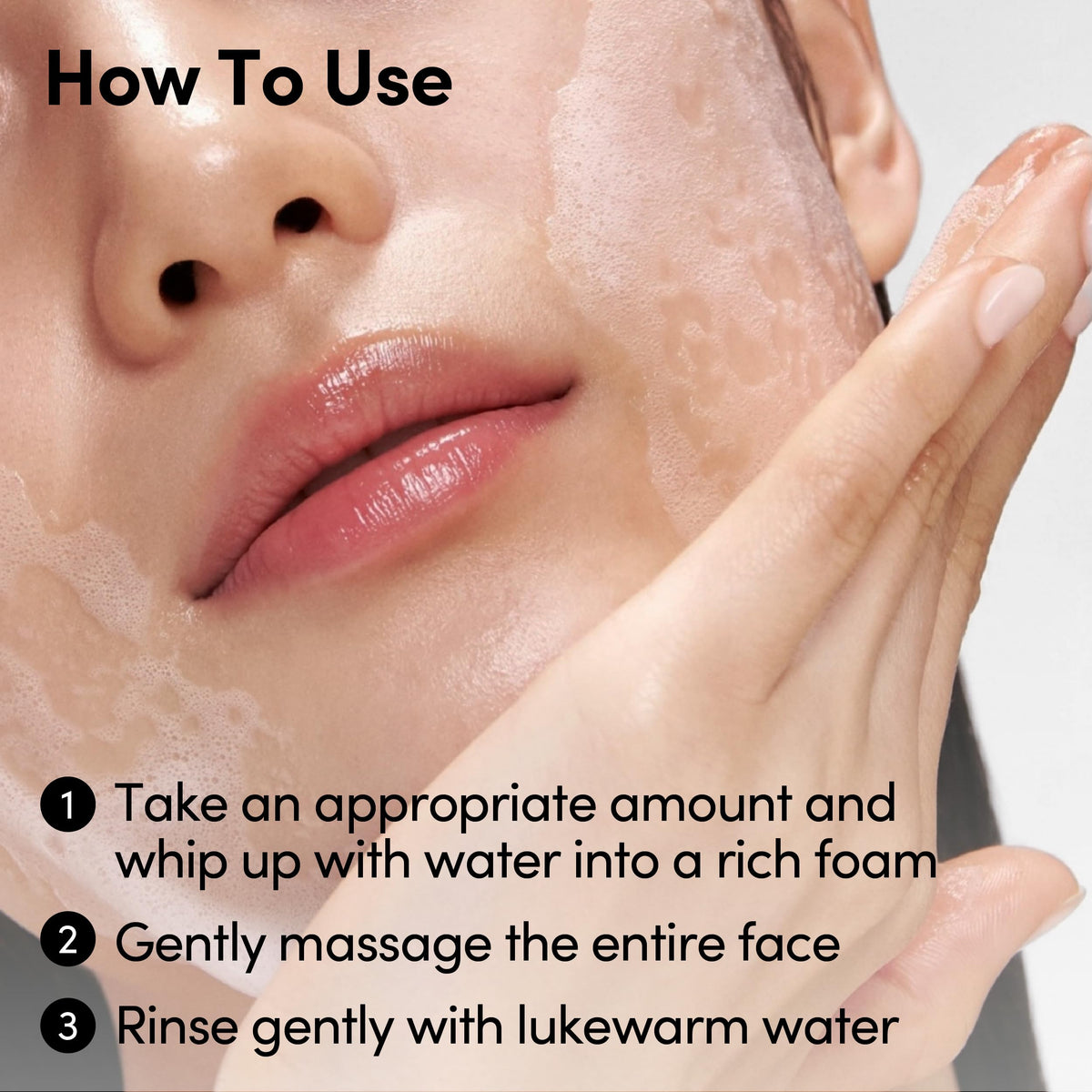 LAGOM foam in hand being applied to face, illustrates gentle non-irritating use