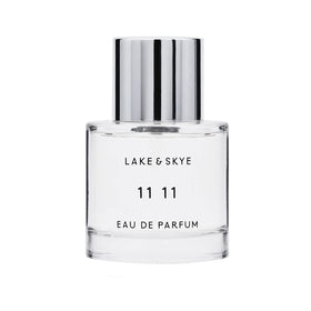 Lake & Skye bottle in hand showing 1.7 oz scale for travel convenience