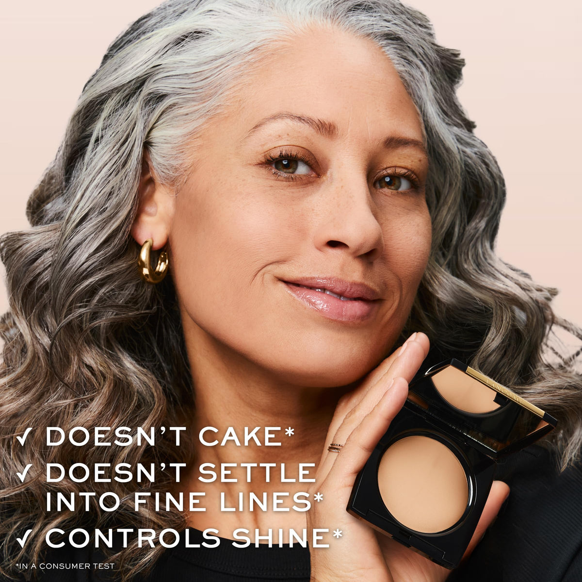 Lancôme swatch on arm showing 360 Honey III match and natural finish benefit